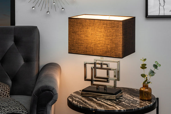 Stylish table lamp on a wooden table with decorative lighting