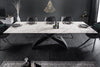 Modern extendable dining table with marble-look ceramic top and geometric metal base, set for six